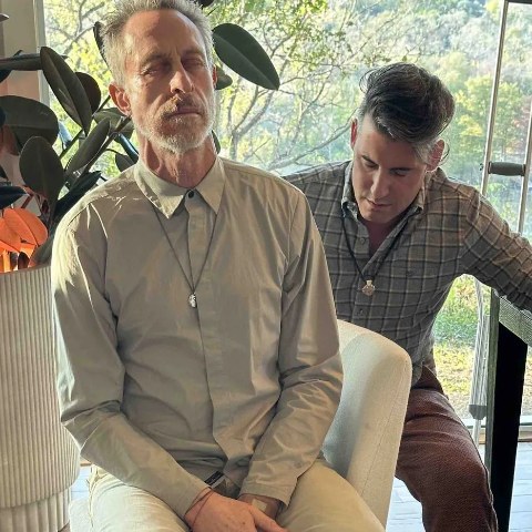 Joel giving Mark a healing